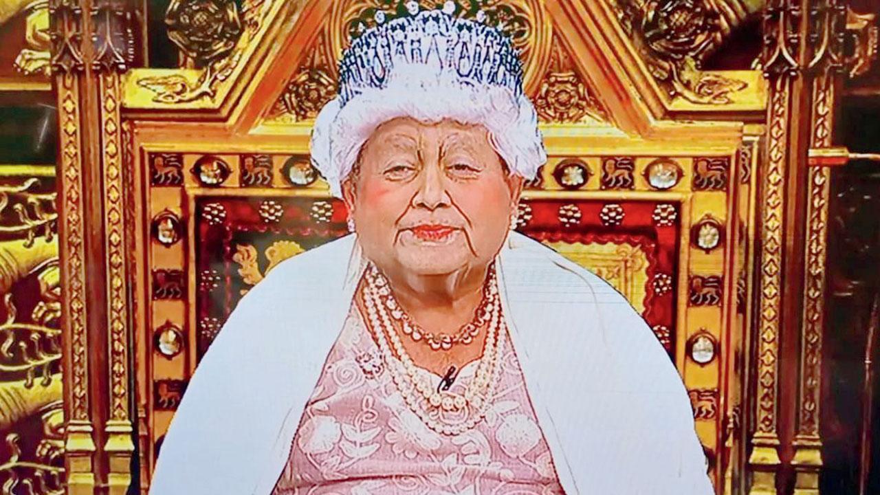 Vijayakar dressed as Queen Elizabeth II