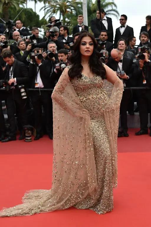 2016: Aishwarya Rai Bachchan's first red carpet appearance in 2016 was in an embellished cape couture gown by Kuwaiti designer Ali Younes for the screening of the film 'Ma Loute (Slack Bay)' at Cannes film festival 2016. Pic/AFP
