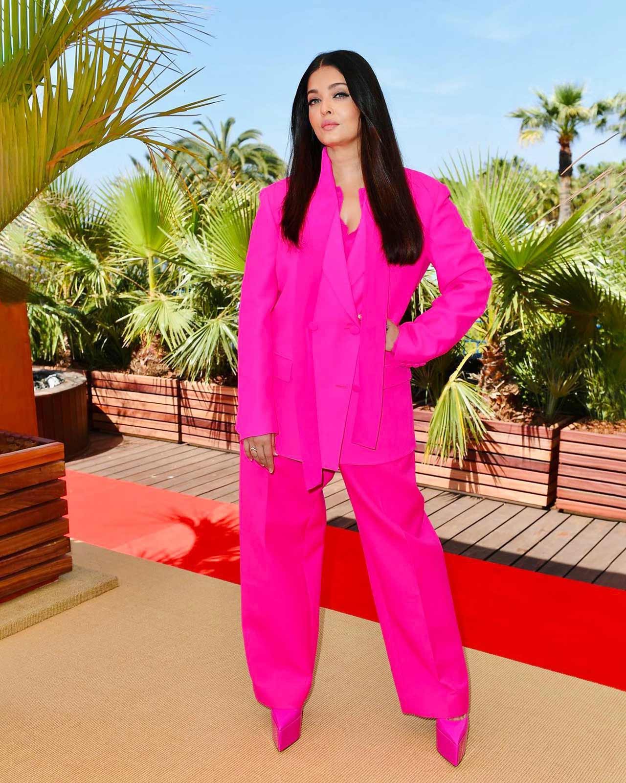 Actor Aishwarya Rai Bachchan chose to wear a pink blazer with matching trousers. She elevated her look with a pair of pink heels. As for her glam game, she opted for minimal makeup with her hair open.