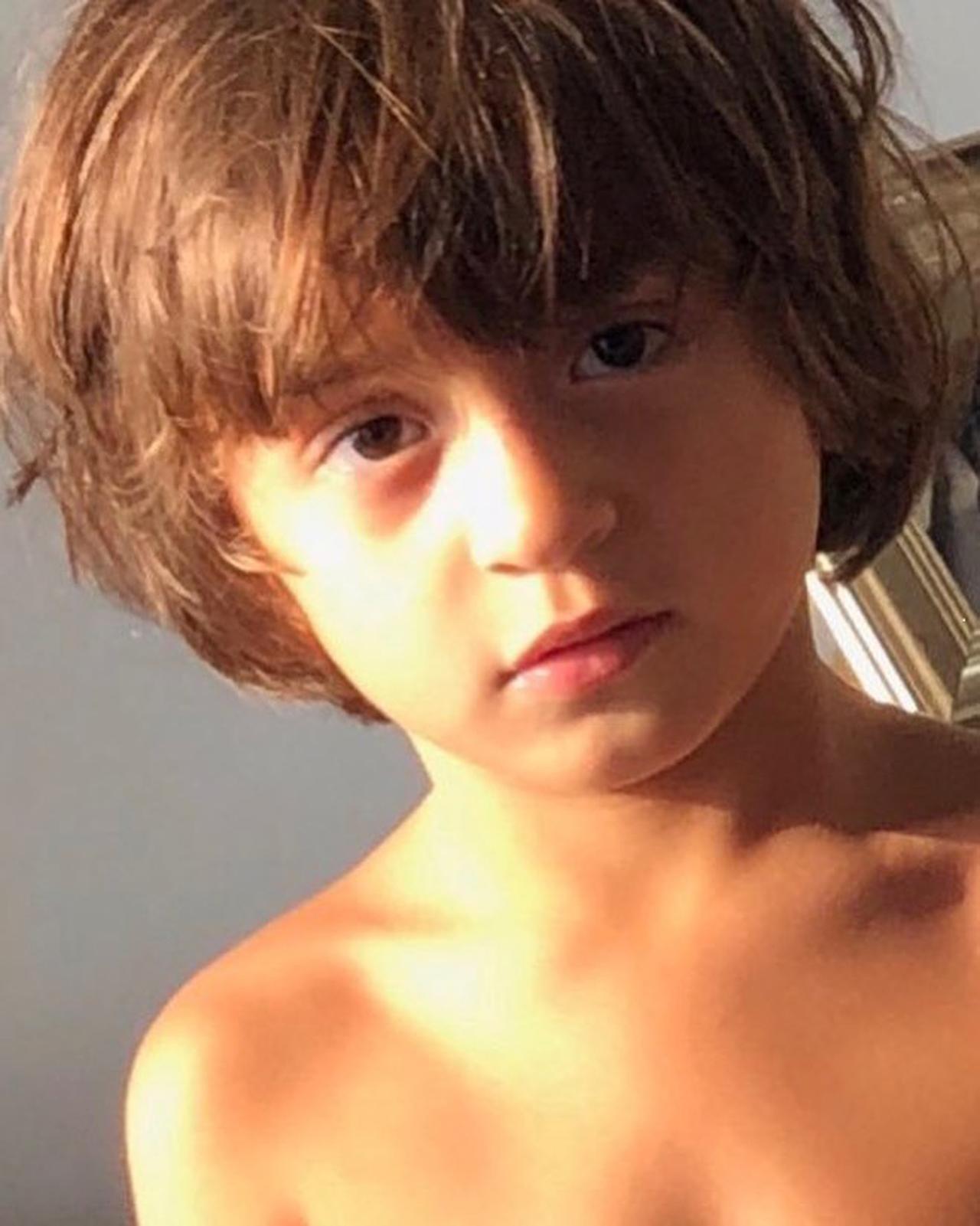 Shah Rukh Khan's toddler AbRam Khan turns 9 today on May 27. We revisit some of his most adorable pictures with SRK, Gauri Khan, Suhana Khan, and Aryan Khan. Well, here, he enjoys his own company and that too shirtless, looking cute as a button.