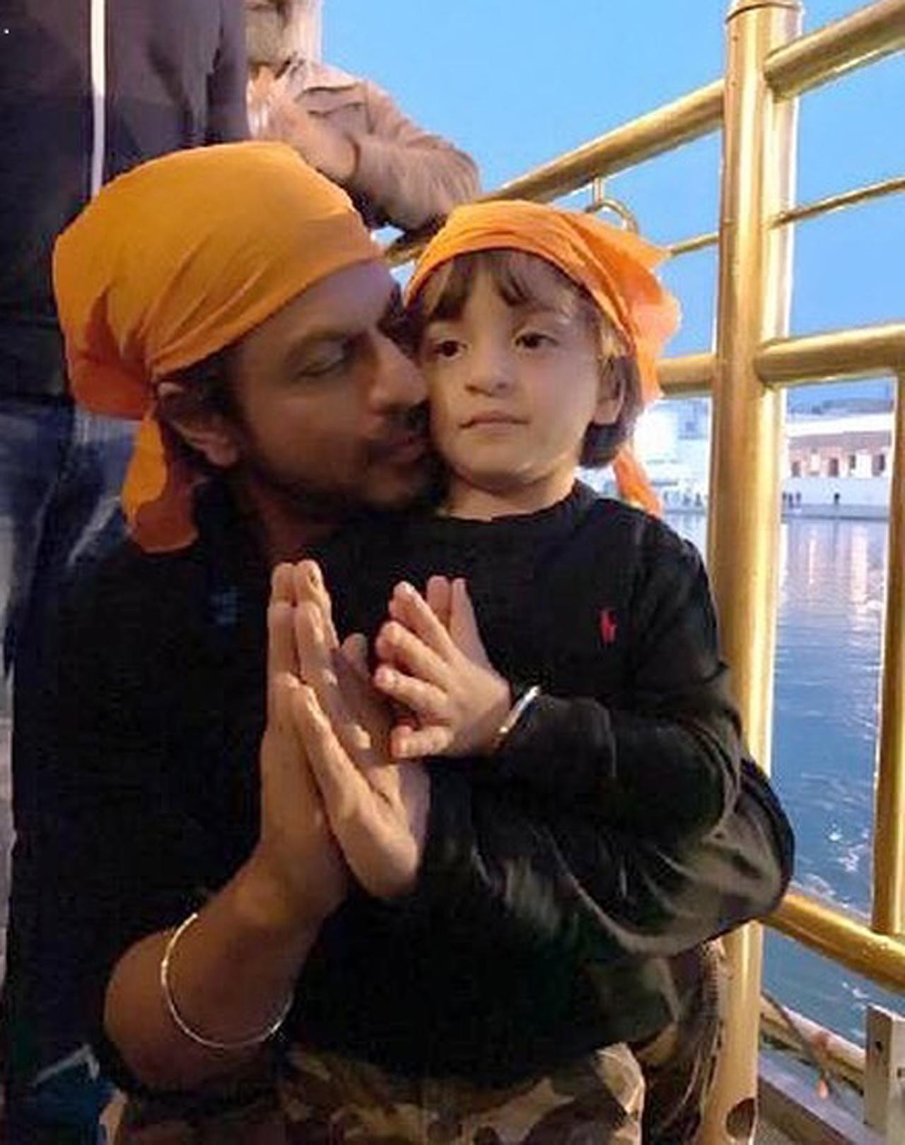 Shah Rukh Khan, AbRam Khan paid a visit to Amritsar and sought blessings of the Almighty. Khan captioned this adorable moment as- 