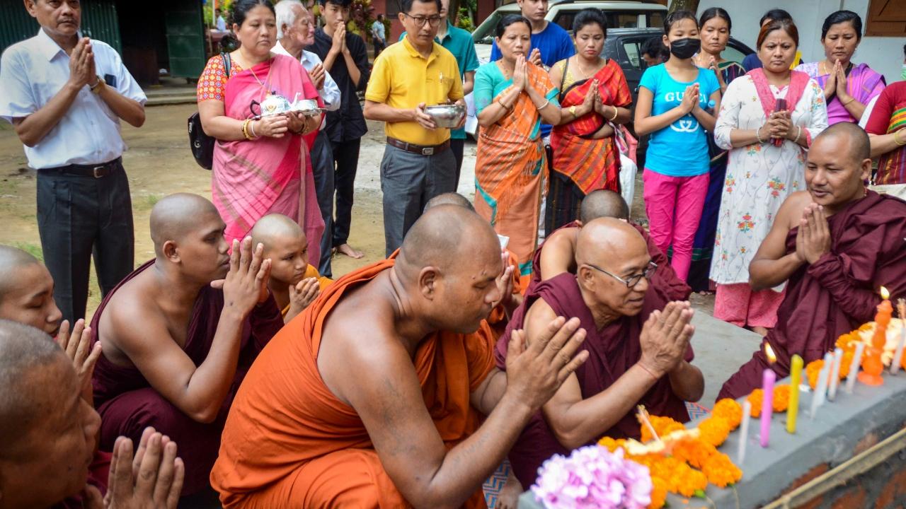 Buddhist devotees offer prayers at Benuban Vihar monastery in Agartala