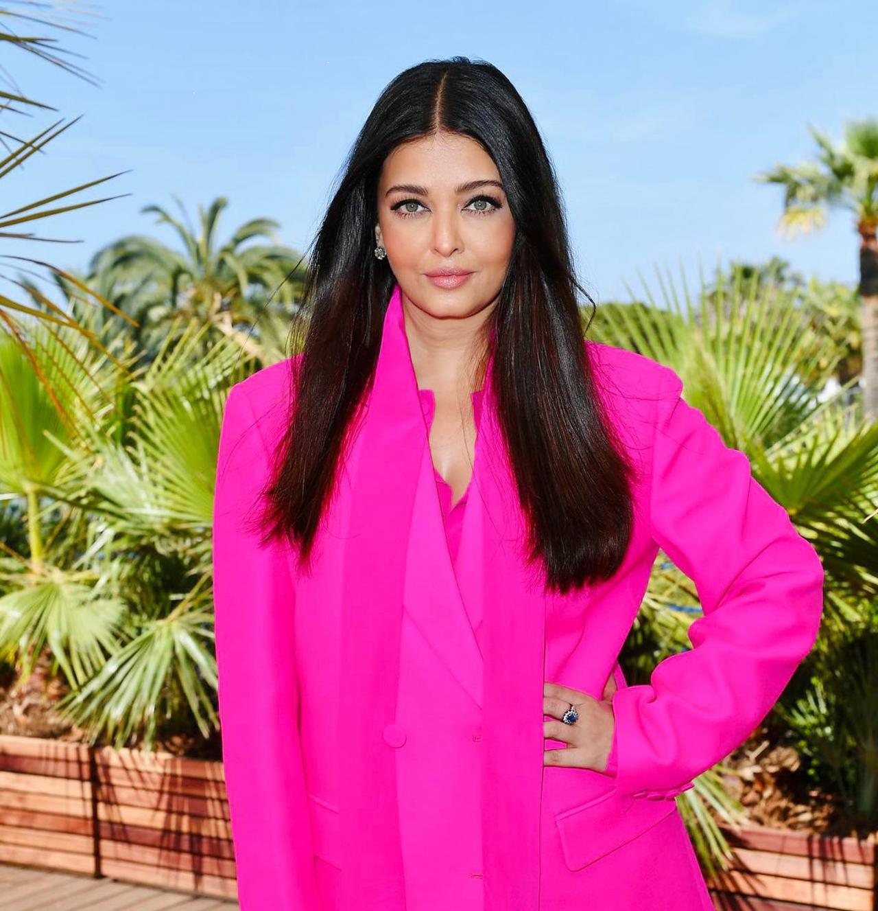 Aishwarya Rai Bachchan is now a Cannes veteran. Fans were waiting for the actress to share pictures from the festival on her Instagram account and finally the moment came. She shared three pictures striking a stunning pose in a pink Valentino suit. The caption had three hearts, and those were pink too.