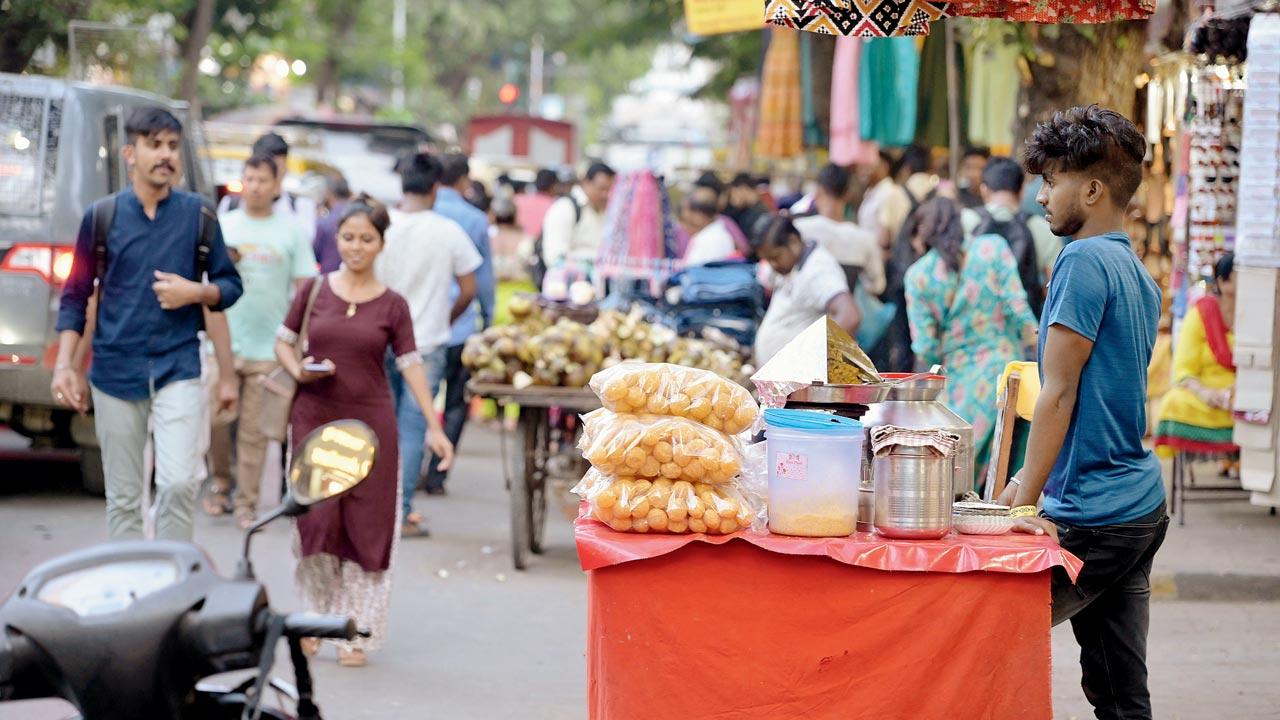 A vendor sells eatables at Ranade Road, Dadar