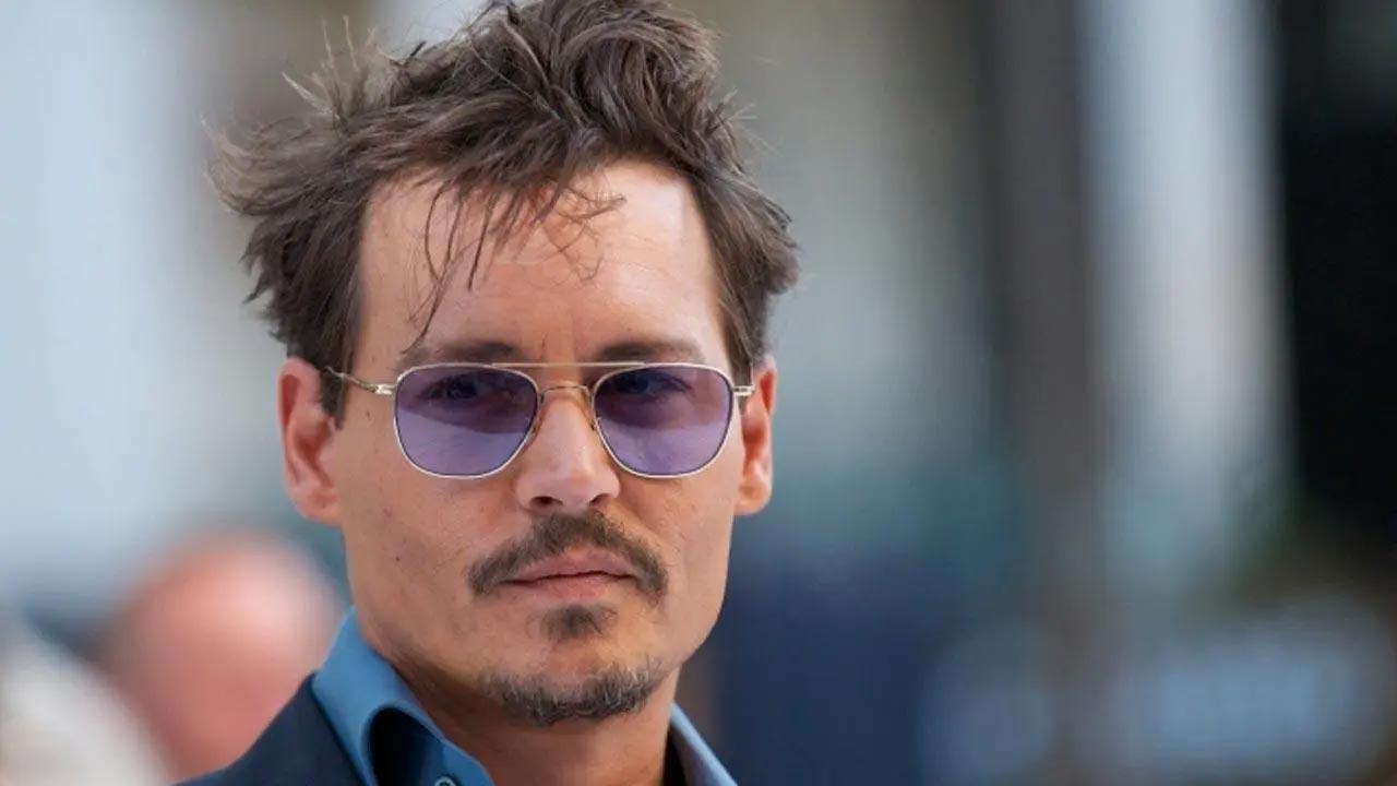 Johnny Depp goes from the courtroom to the stage