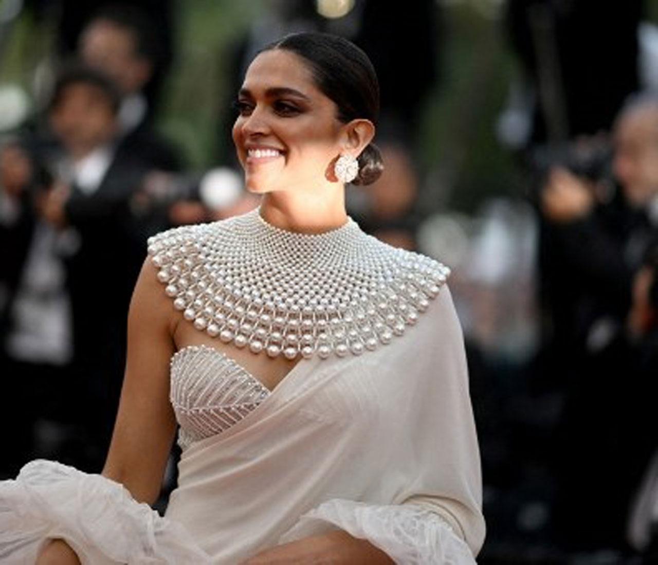 Deepika Padukone stuns in an ivory sari at Cannes Film Festival