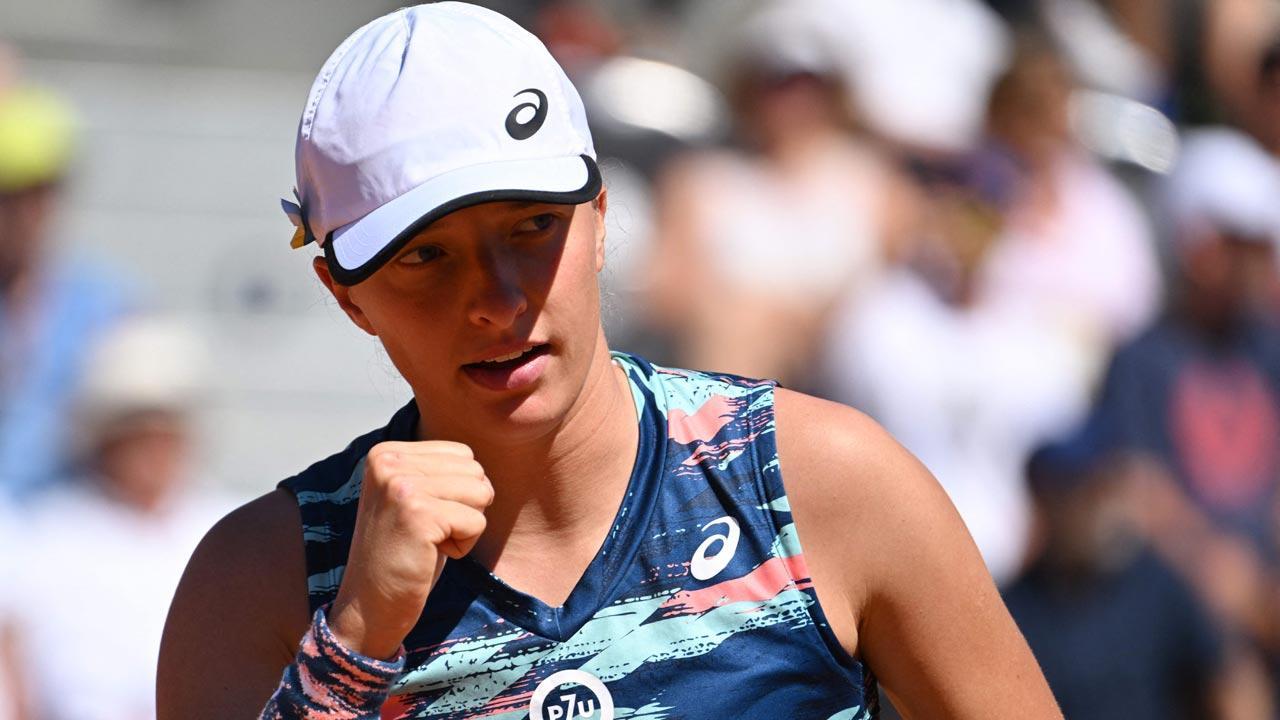 Iga asserts No. 1 status with win over Andreescu