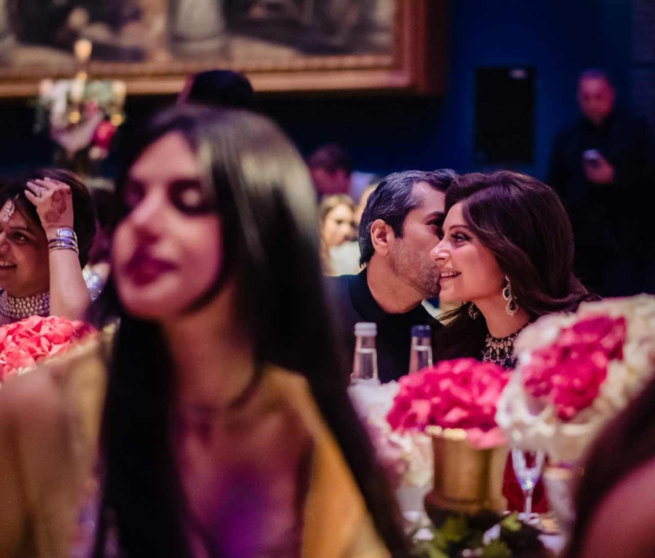 In the pictures, Kanika Kapoor is seen wearing a red colour lehenga while Gautam complemented the bride with a black Nehru Coat.