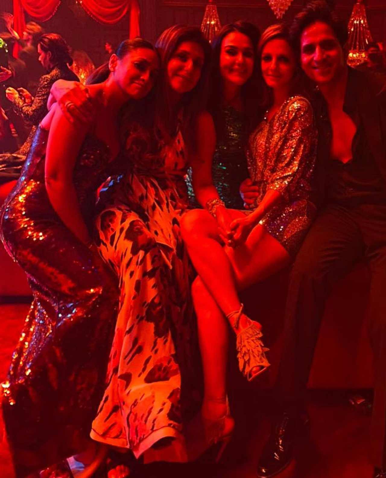 Anaita Shroff Adjania with Arslan Goni, Sussanne Khan, and Preity Zinta at Karan Johar's 50th birthday celebration.