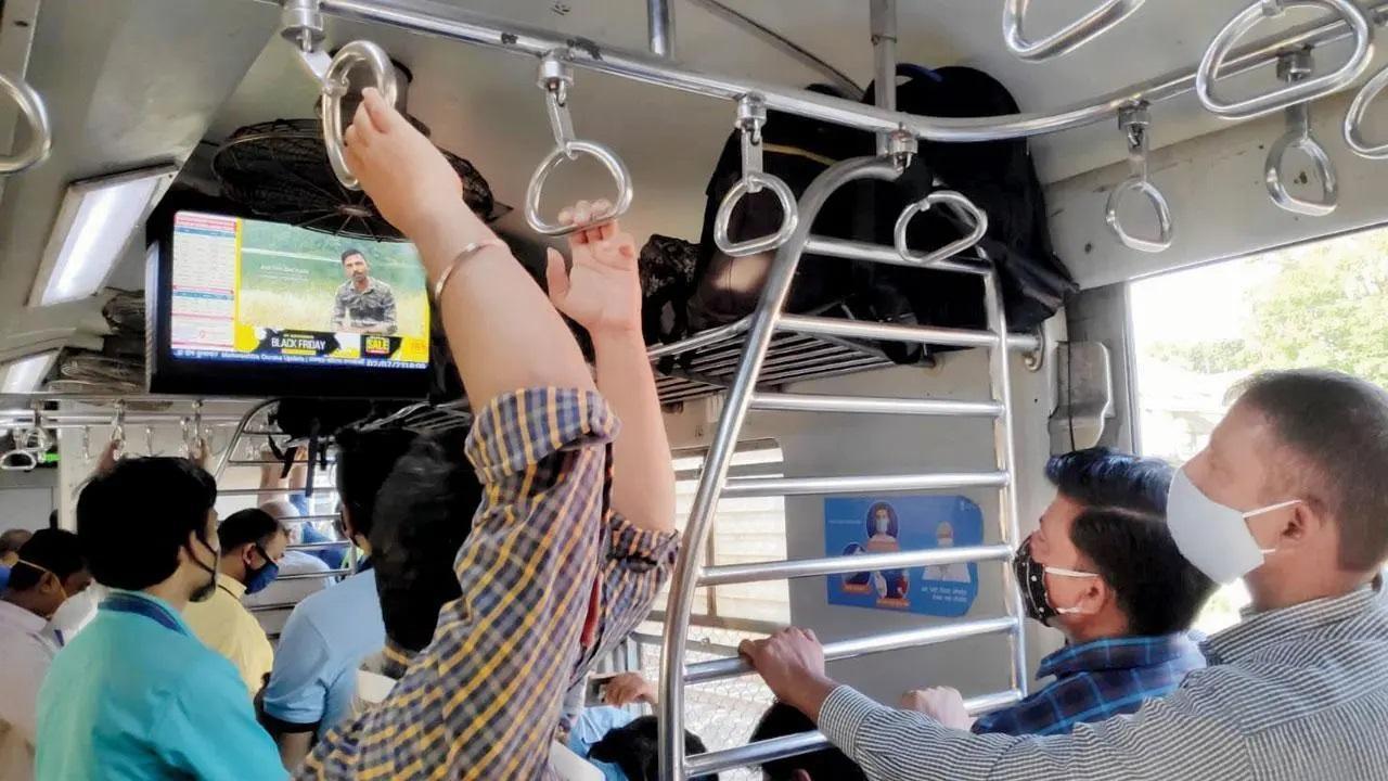 Watch video: Man falls off his seat while sleeping on local train