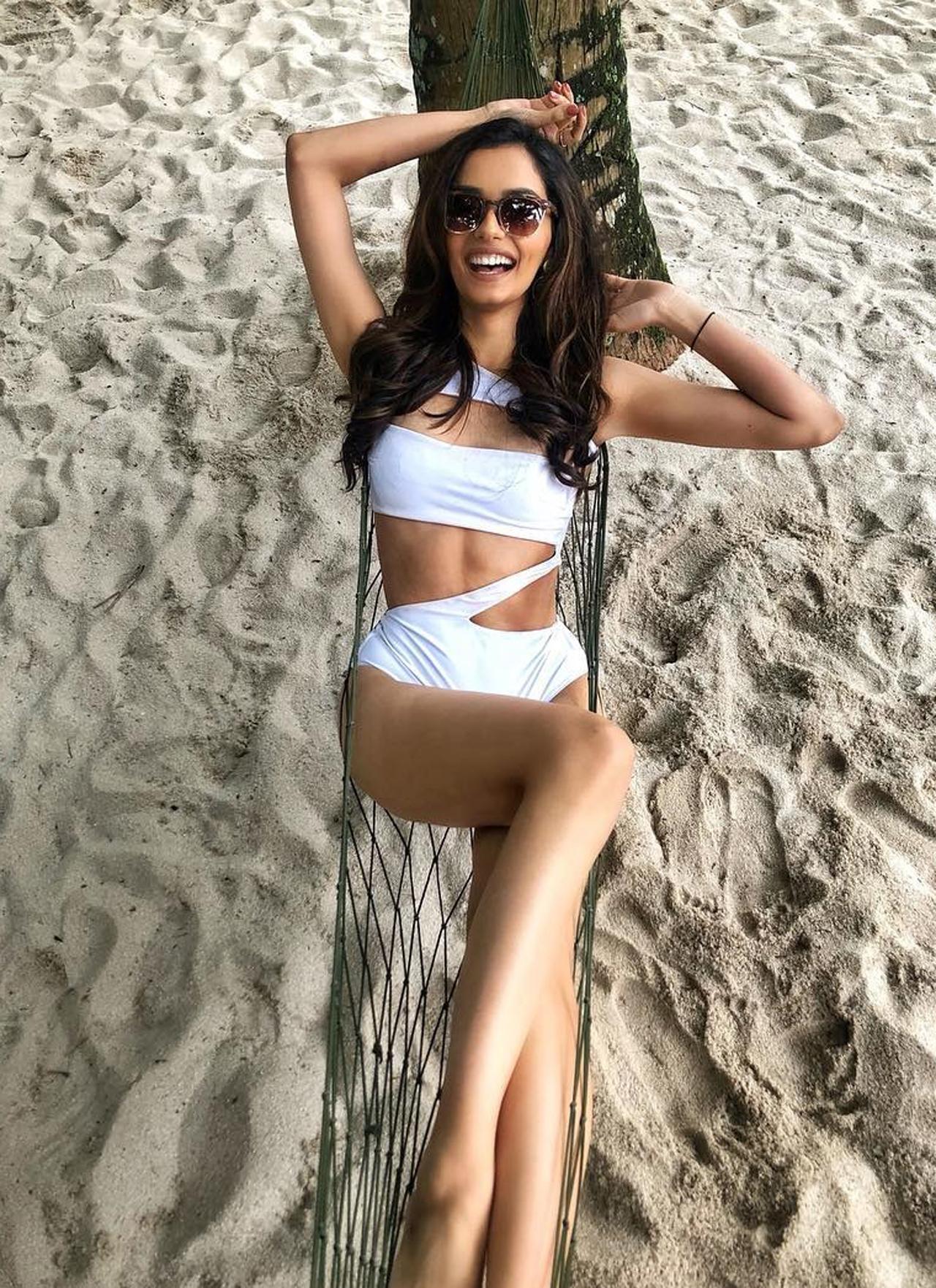 China
How many from Bollywood have holidayed in China? Manushi has. She also poses in a white swimsuit and looks ravishing. She writes in Chinese too. This is how it goes- 