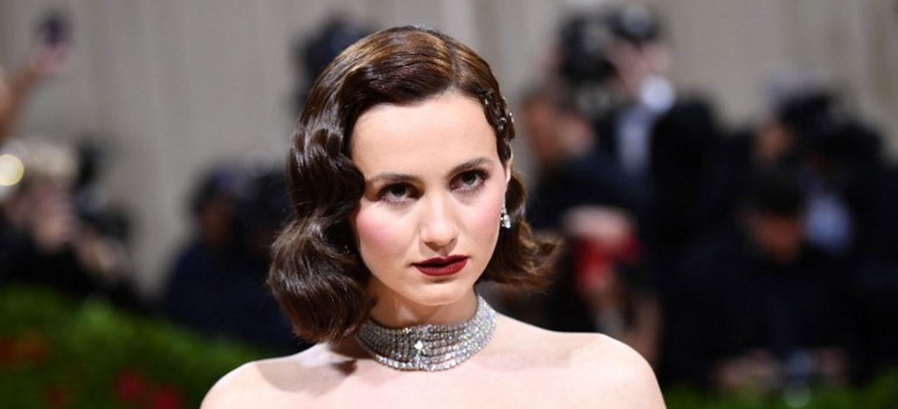 The 'Euphoria' walked her first Met Gala red carpet in a black seductive old style Hollywood ensemble by Miu Miu. She accessorised it with a Cartier diamond choker, crimson lipstick, and sleek hair waves.