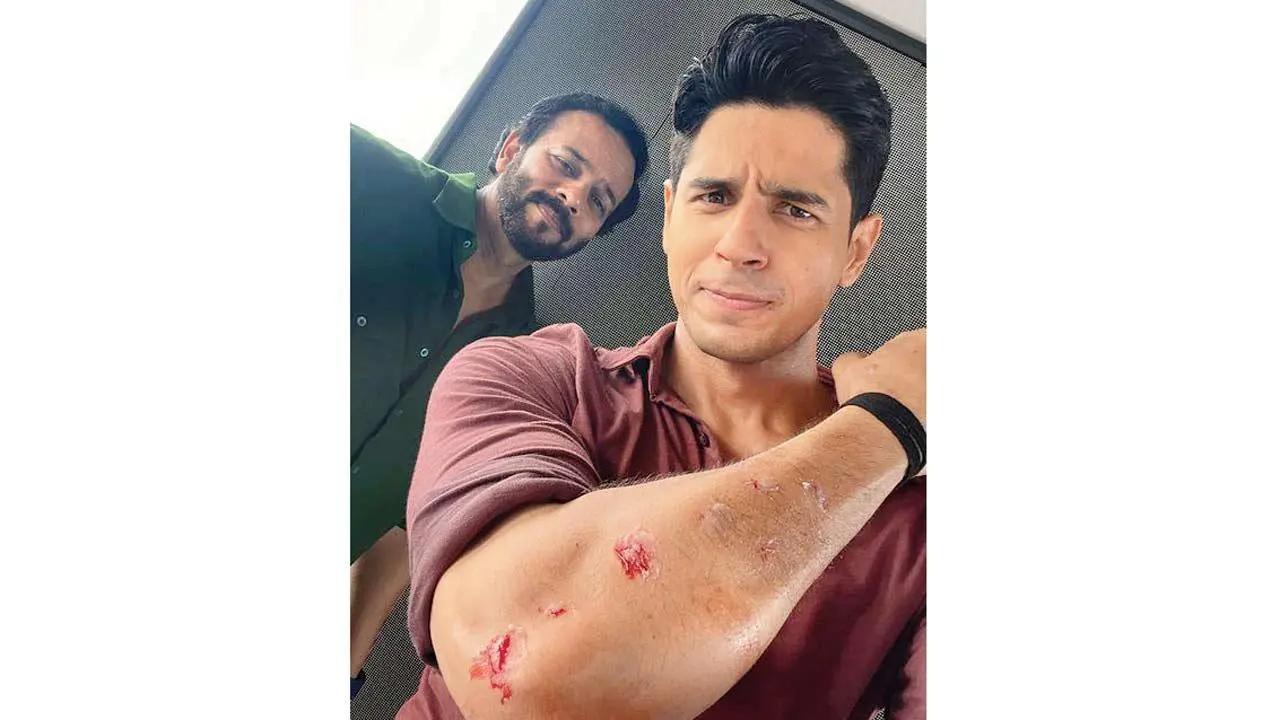 Actor Sidharth Malhotra got minor scars while shooting for his web show 'Indian Police Force' under Rohit Shetty's direction in Goa recently. On Sunday, Sidharth took to Instagram and shared a glimpse of a hardcore action scene from the series where he is seen taking two goons with full force. Read the full story here