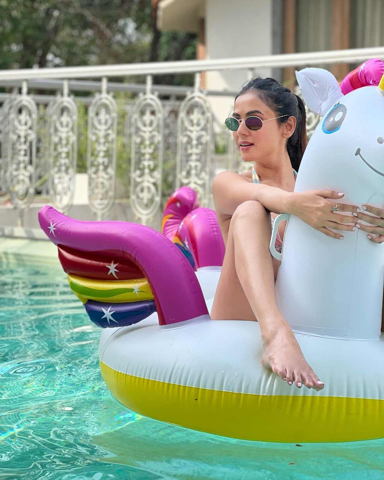 Sonal Chauhan shared a fun poolside picture, posing with a unicorn float, wishing herself on social media.