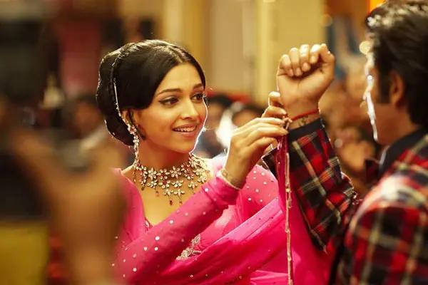 Deepika Padukone's Bollywood debut opposite Shah Rukh Khan proved to be a breakthrough. She featured in dual roles - Shantipriya, a leading actress of the 1970s, and later as Sandy, an aspiring actress. In preparation for her performance, Deepika watched several films of Helen and Hema Malini to study their body language and grace. 'Om Shanti Om' was a commercial success, and emerged as the highest grossing film of the year. Deepika won the Filmfare Award for Best Female Debut and received her first nomination in the Filmfare Award for Best Actress category.
