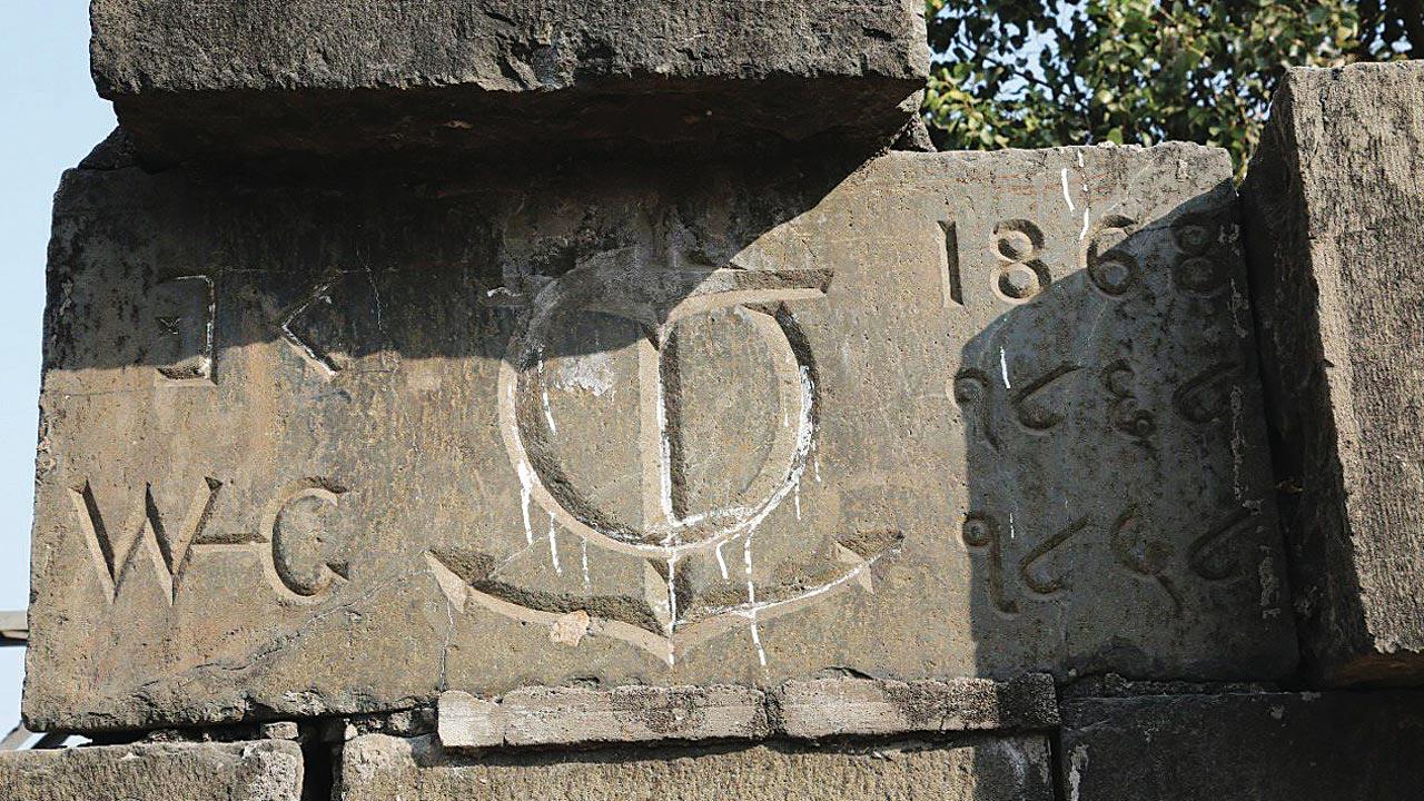 A plaque on the 164-year-old Carnac Bunder bridge