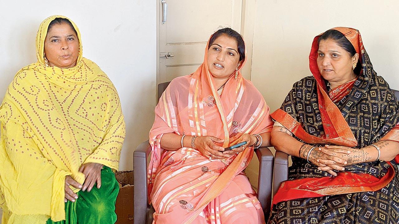 Hiral Gadhvi (centre), wife of AAP’s CM face Isudan Gadhvi, at the campaign office in Khambhalia