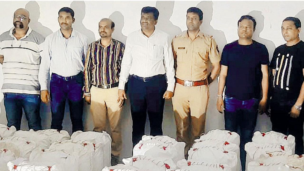 ANC officers with the seized drug in Gujarat. File pic