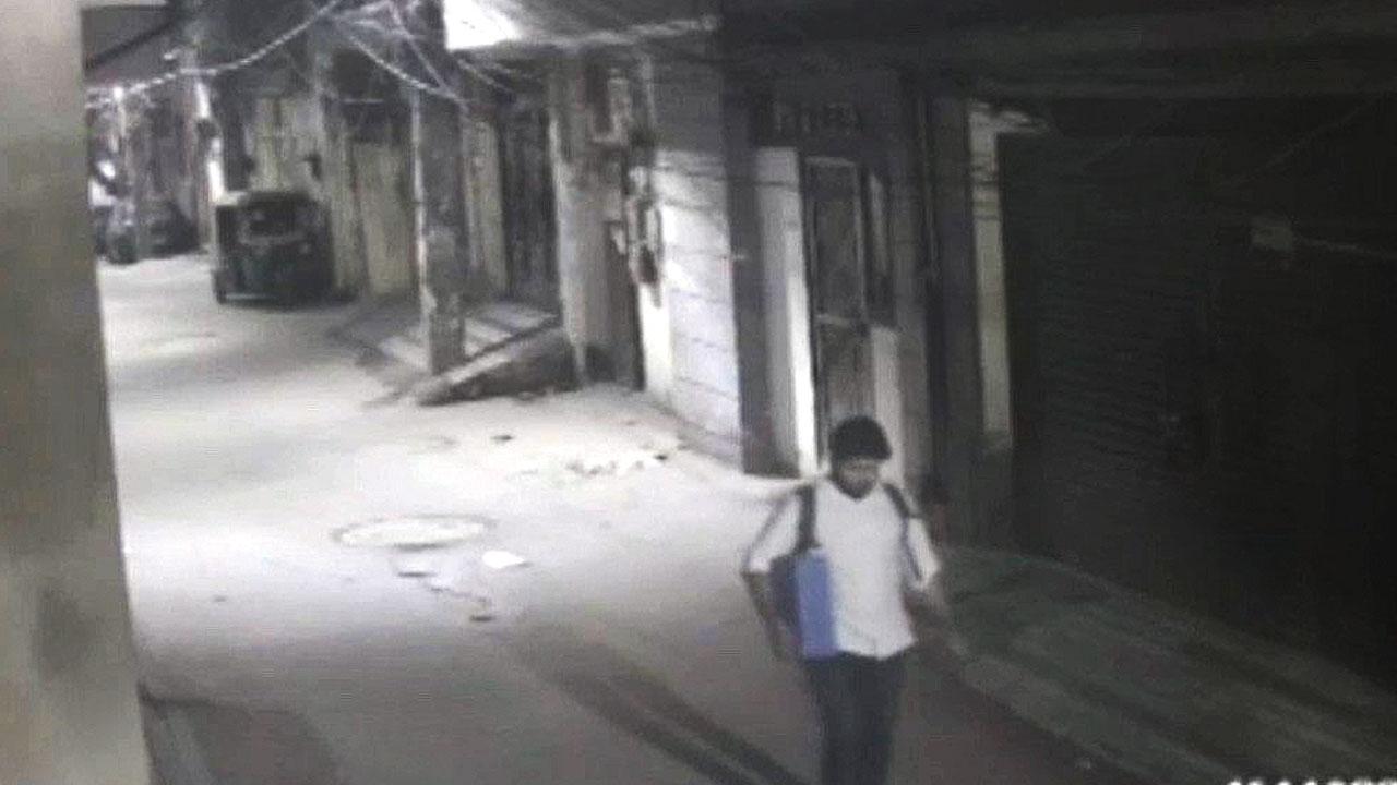 CCTV grabs from October 18 showing Poonawala with two bags in Mehrauli