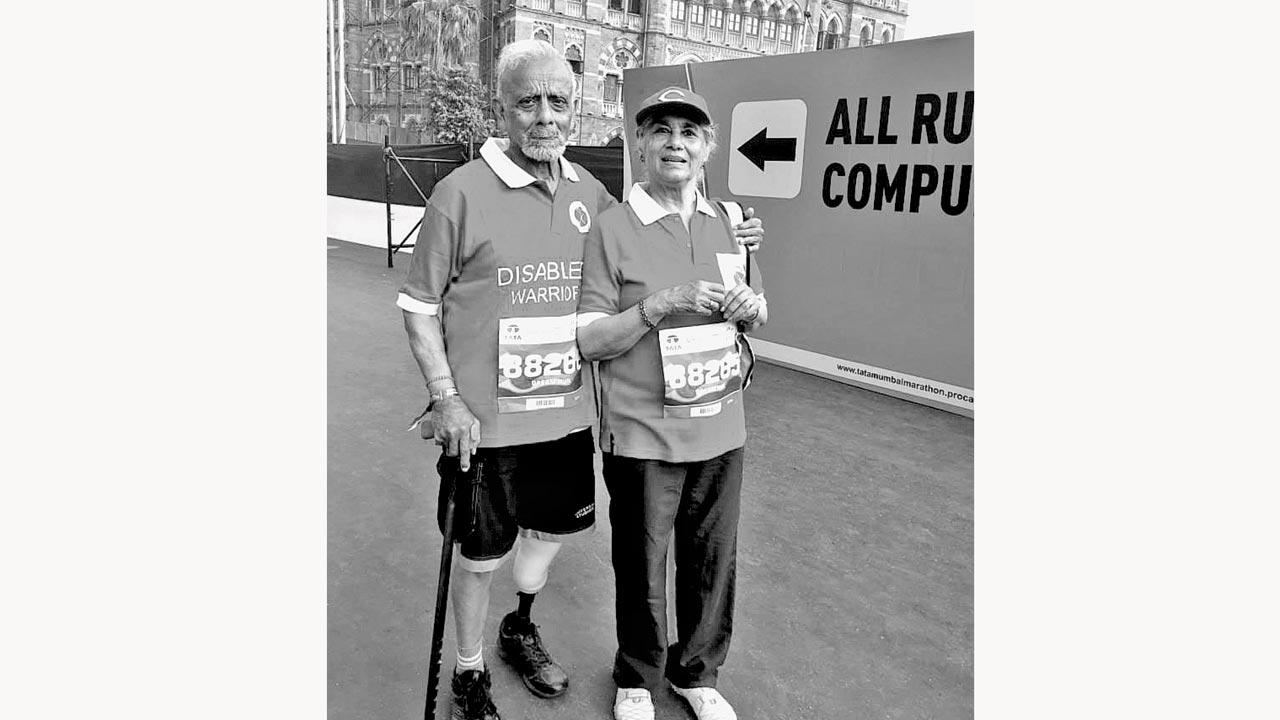 A keen marathon runner: with Priscilla at the Mumbai Marathon. Pics Courtesy/Cartoos Saab by Major General Ian Cardozo, Roli Books