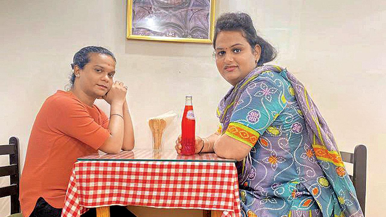 Staff members Akshara Bhagane and Bonny Vasavle at the café