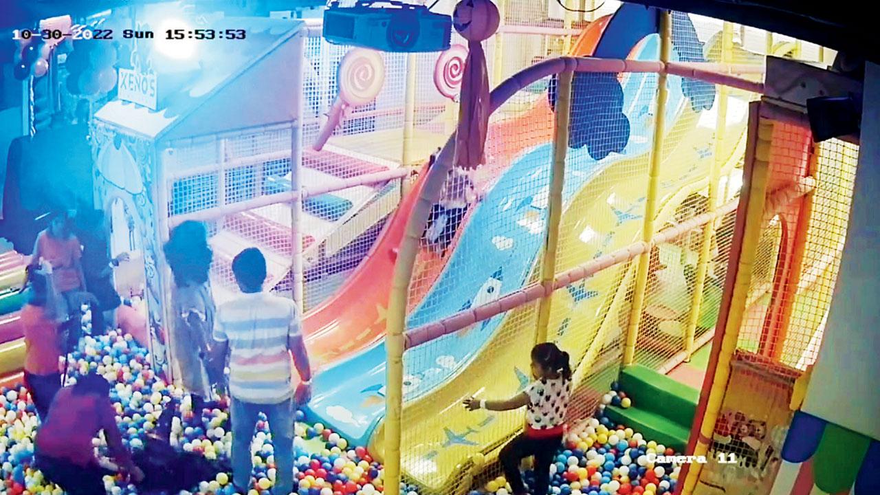 A grab from CCTV footage showing the girl (circled) on the slide at the kids’ zone of Neelyog mall at Ghatkopar East on October 30