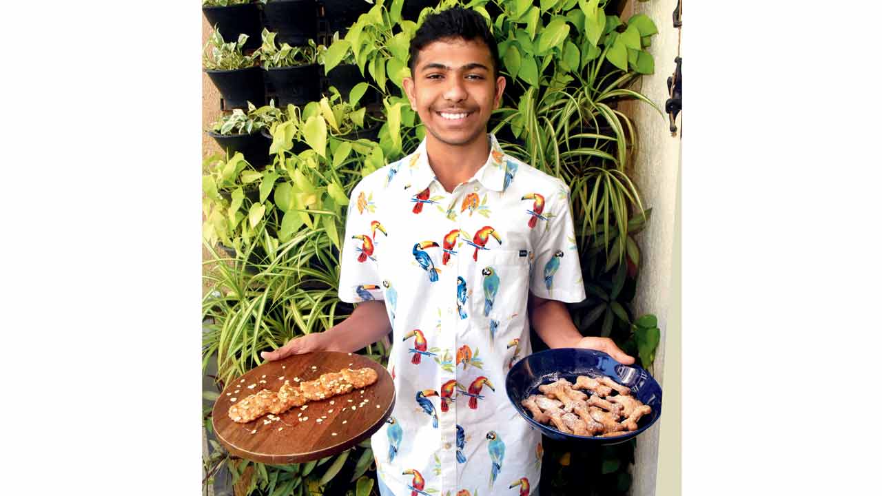 Andheri resident Caydn Louzado making recipes for friends—the two and four legged ones—from A Cookbook for Special Days, Special People 