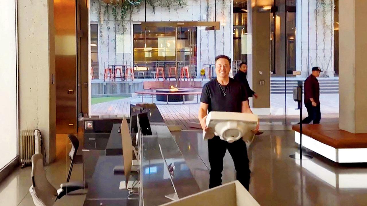 A moment from a video shared by Musk of himself walking into the Twitter HQ in California carrying a sink after the takeover. Pics Courtesy/Getty Images