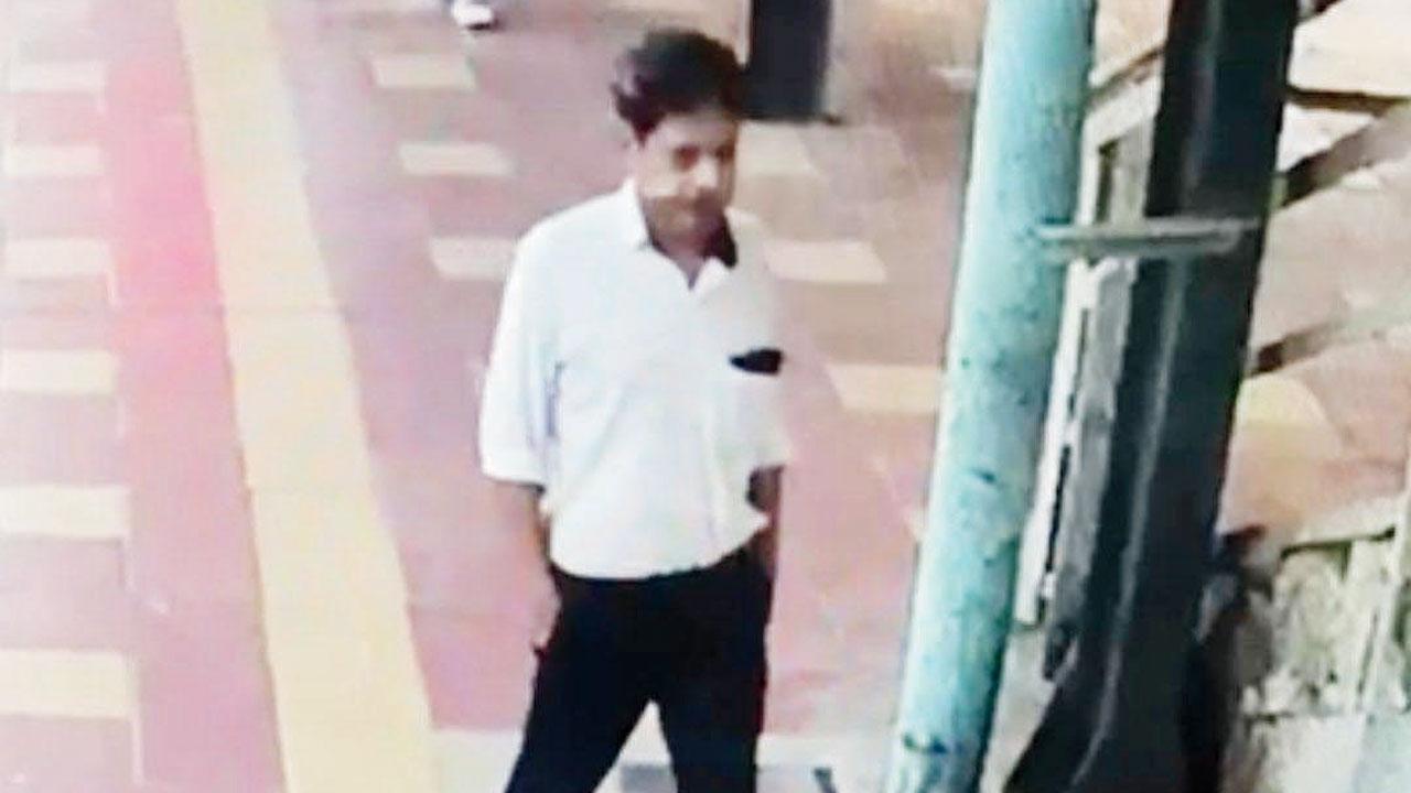 A video grab from CCTV footage shows David Peter Gamjya loitering aimlessly at Mumbai Central station on October 15