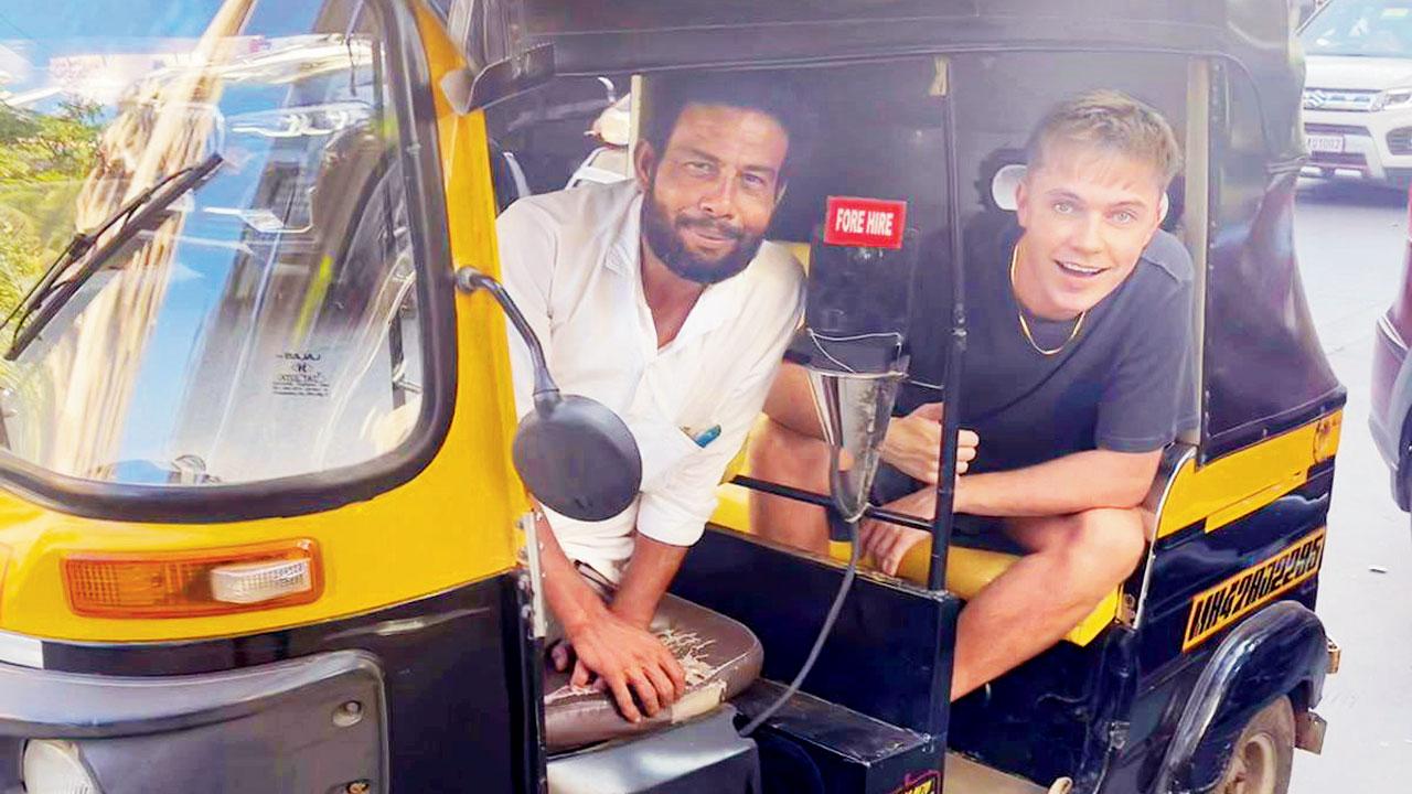 HRVY poses with the trusted ride that got him through the traffic in Bandra