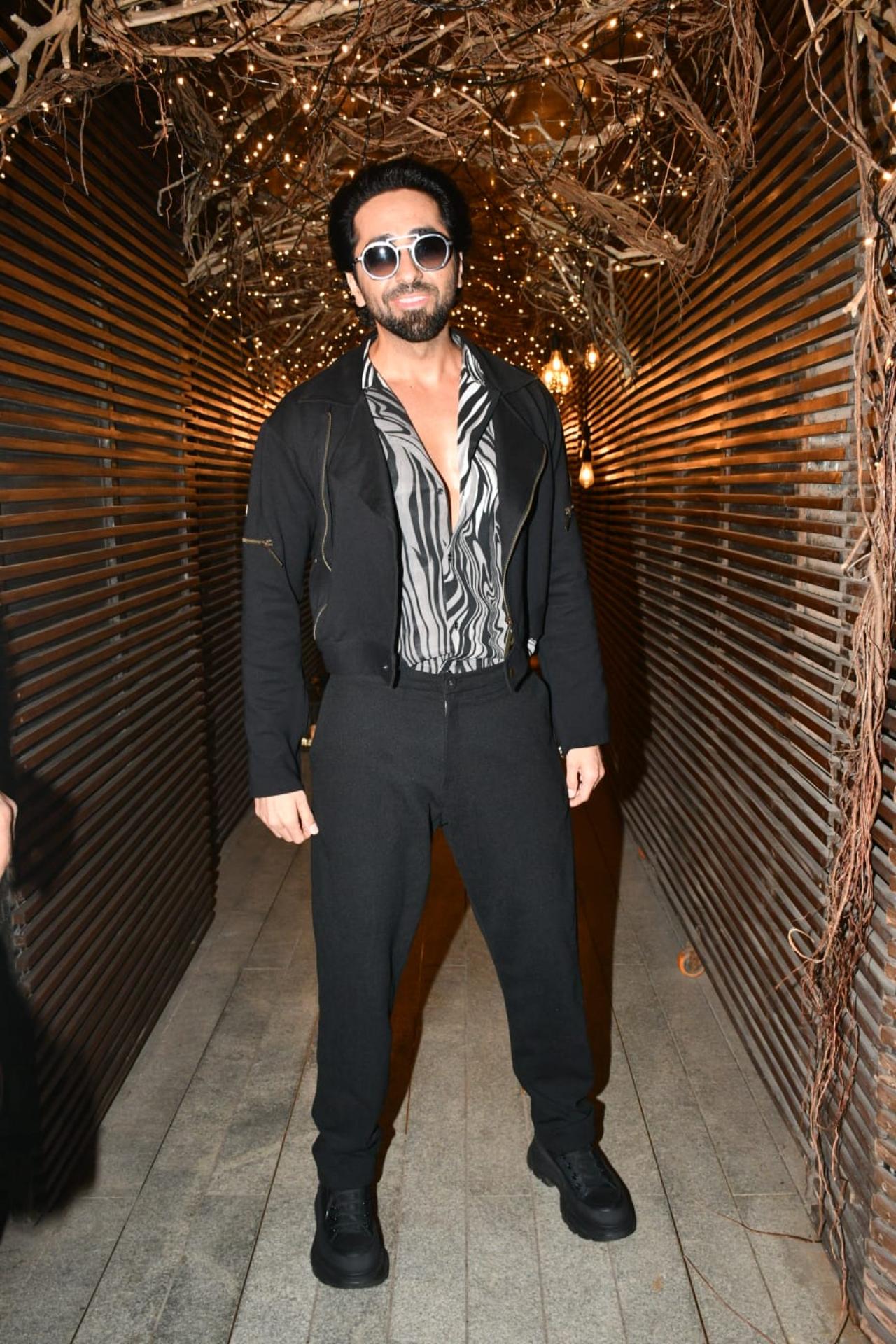 Ayushmann Khurrana who is busy promoting his upcoming film 'An Action Hero' was seen looking no less a hero in all black suit and funky glasses