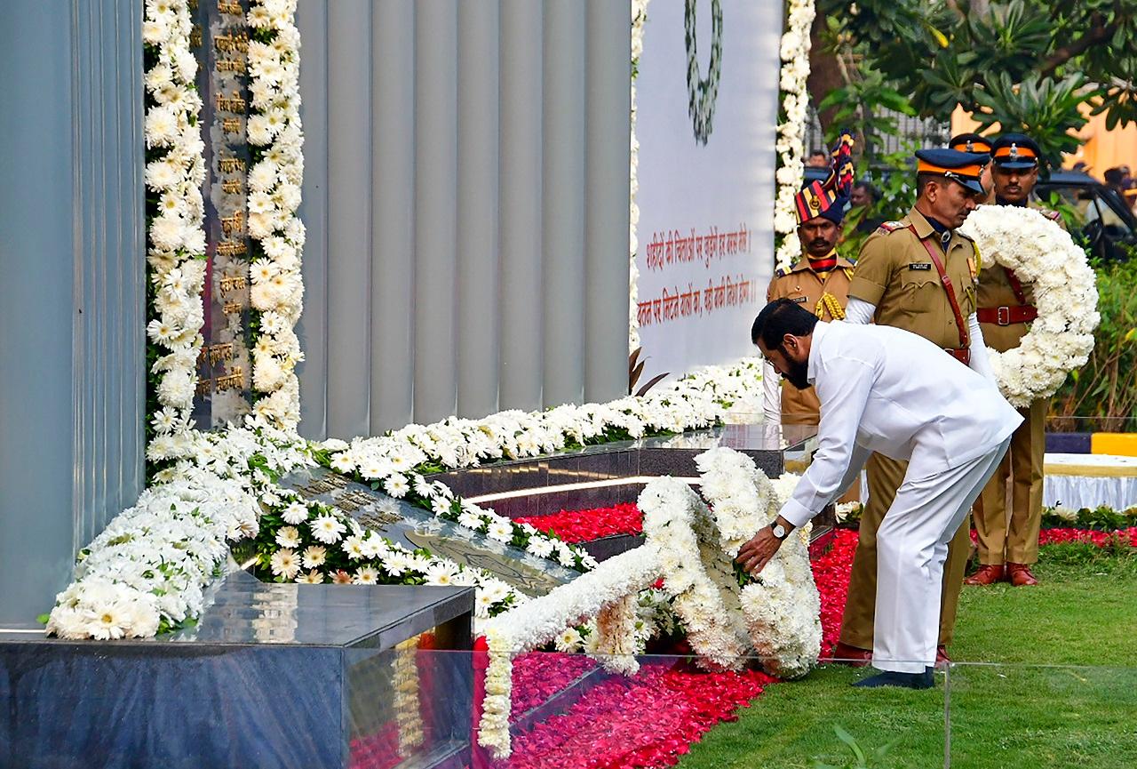 They paid tributes at the martyrs' memorial in the premises of the Police Commissioner Office in south Mumbai. (Pic/PTI)