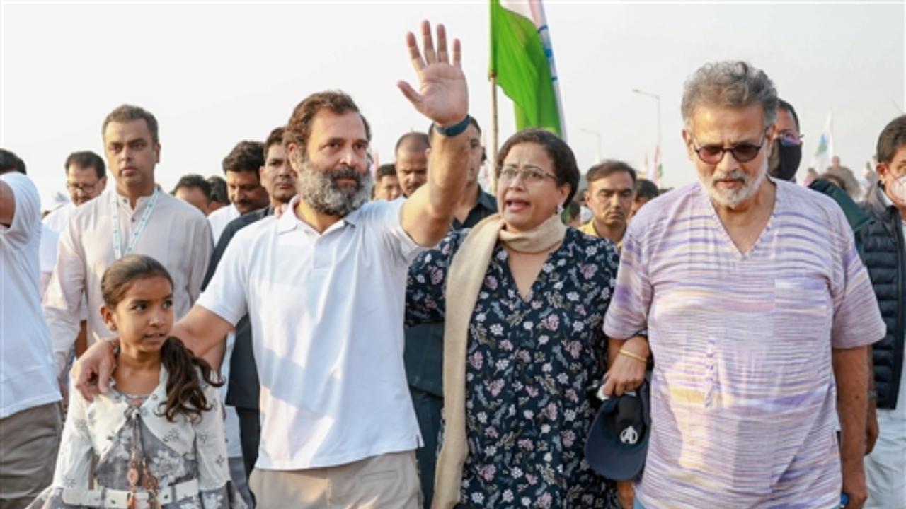 Congress leader Rahul Gandhi with Tushar Gandhi, actress Mona Ambegaonkar and other supporters during the party's 'Bharat Jodo Yatra' Pic/PTI