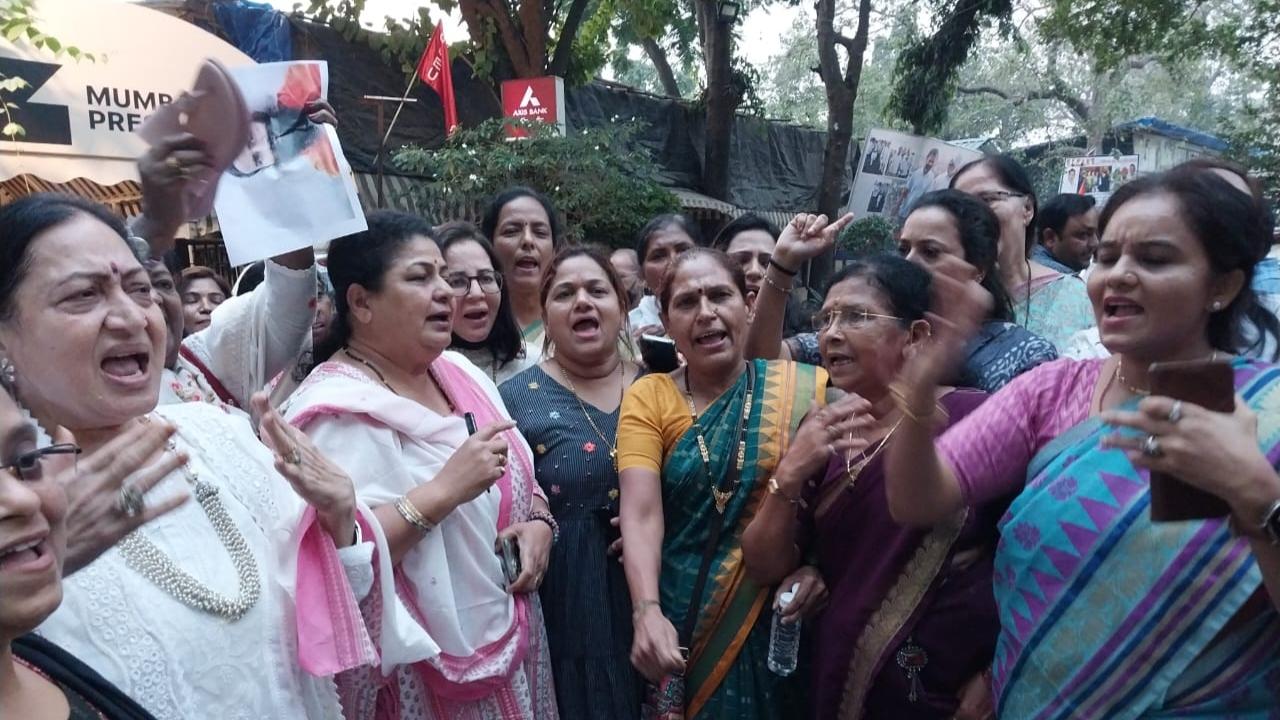Ladies wing of Congress party workers protested against Baba Ramdev outside the MRCC office, a day after Baba Ramdev blurted out an objectable remark in Thane