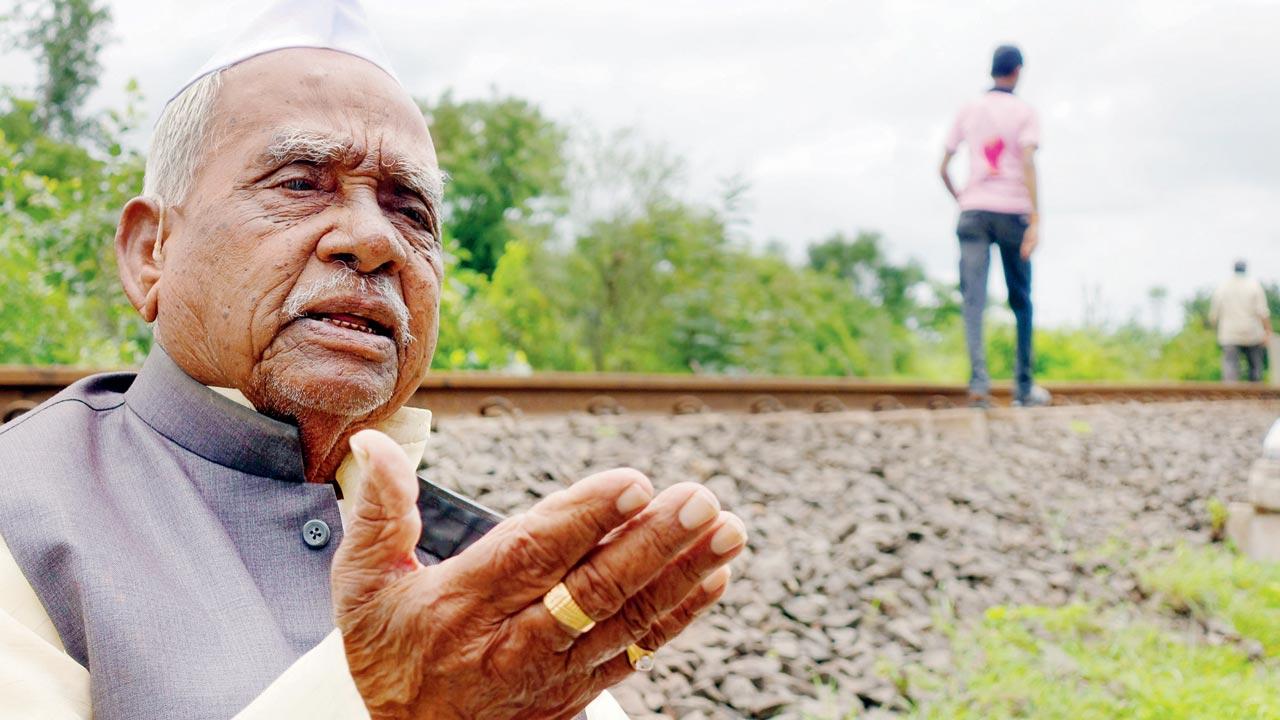 Sainath (seen here with Lad) decided to make Bhau sit beside the tracks at Shenoli railway station where he had looted the Pune-Miraj train in 1943 to help jog his fading memory