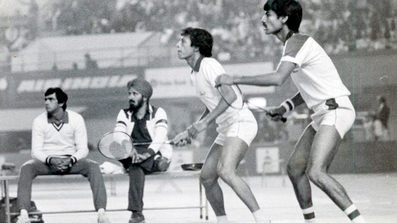 Vikram Singh Bisht (right) and Partho Ganguli in action during an event in India in the 1980s. They are watched by badminton icon Prakash Padukone (extreme left). Pic/MID-DAY ARCHIVES