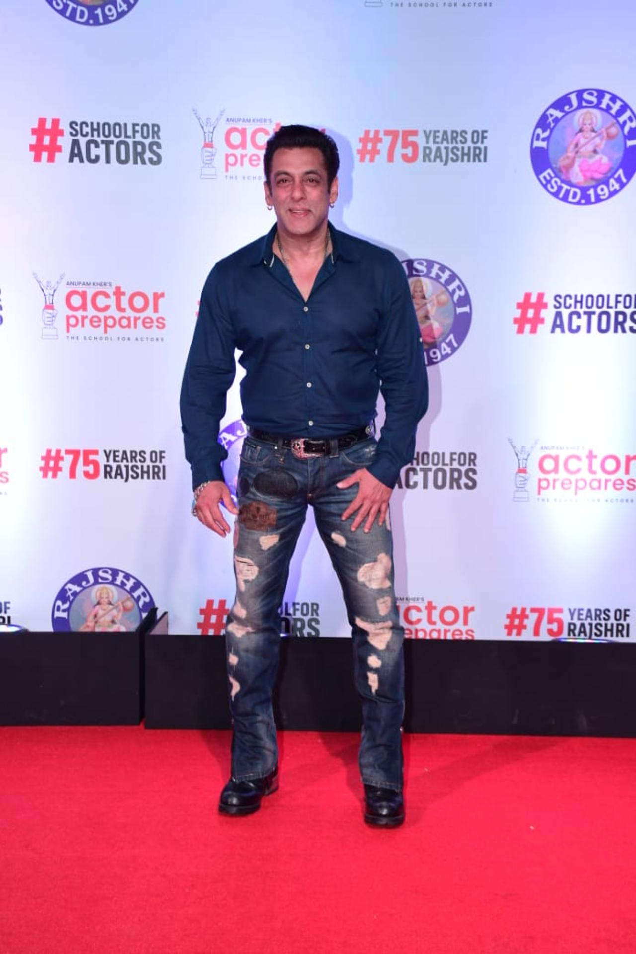 Salman Khan was seen in a jolly mood at the premiere as he interacted with the Barjatya and the cast of the film including Anupam Kher and Boman Irani. The superstar had arrived solo dressed in a navy blue shirt and blue denims