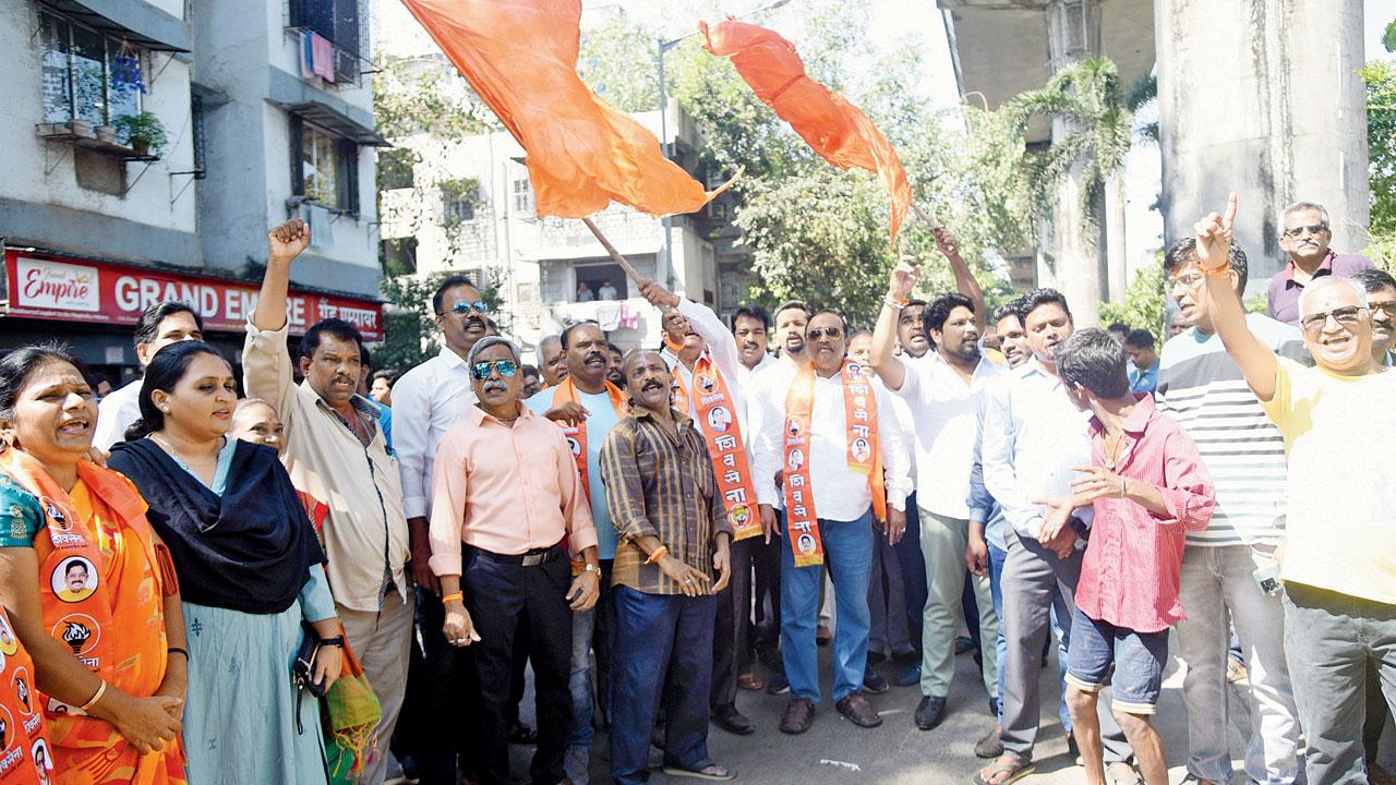 Shiv Sena (Uddhav Balasaheb Thackeray) workers celebrate after winning the bypoll, on Sunday. Pic/Sameer Markande