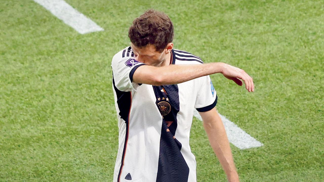 Germany’s Thomas Muller wears a dejected look v Japan on Wednesday. Pic/Getty Images