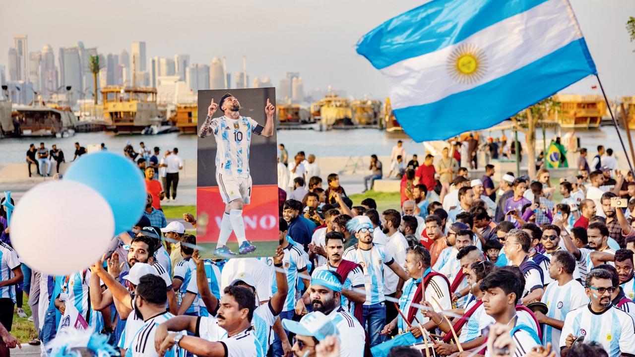 File photo of fans supporting Argentina at a waterfront in Doha. Pic/AFP