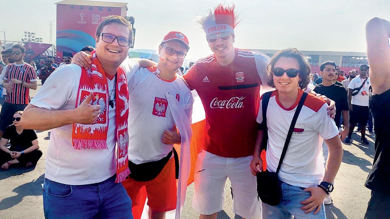 Poland’s Jakub Kowalski (left) with friends at the Al-Bidda fab park in Doha on Tuesday