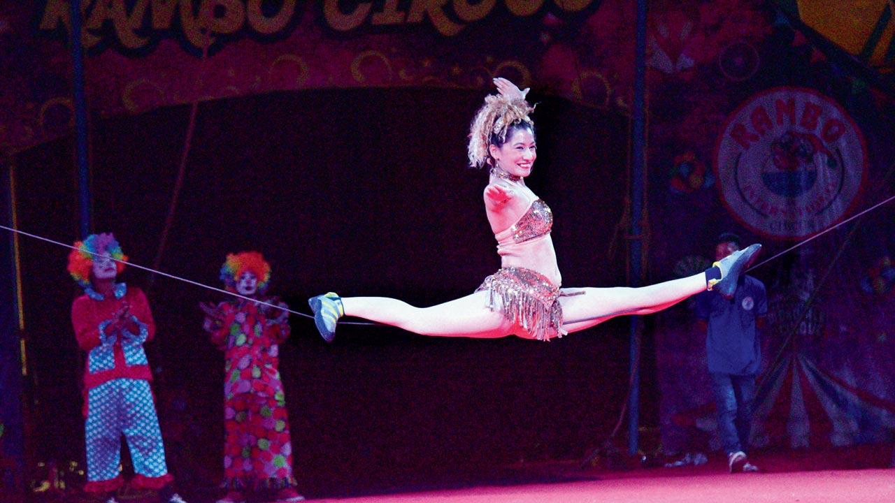 A gymnast shows off shows off her moves at Rambo Circus, currently stationed in Borivli West