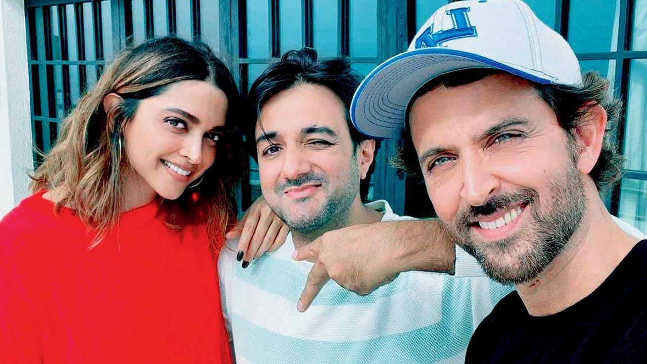 Fighter director Siddharth Anand flanked by Deepika Padukone and Hrithik Roshan