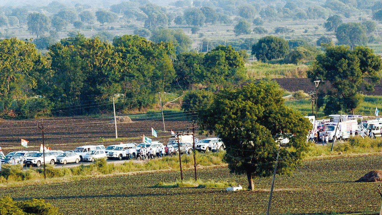 A cavalcade of vehicles with senior party workers and emergency ambulances seen following the yatris who had arrived in droves to join the Bharat Jodo Movement in the Nanded district 