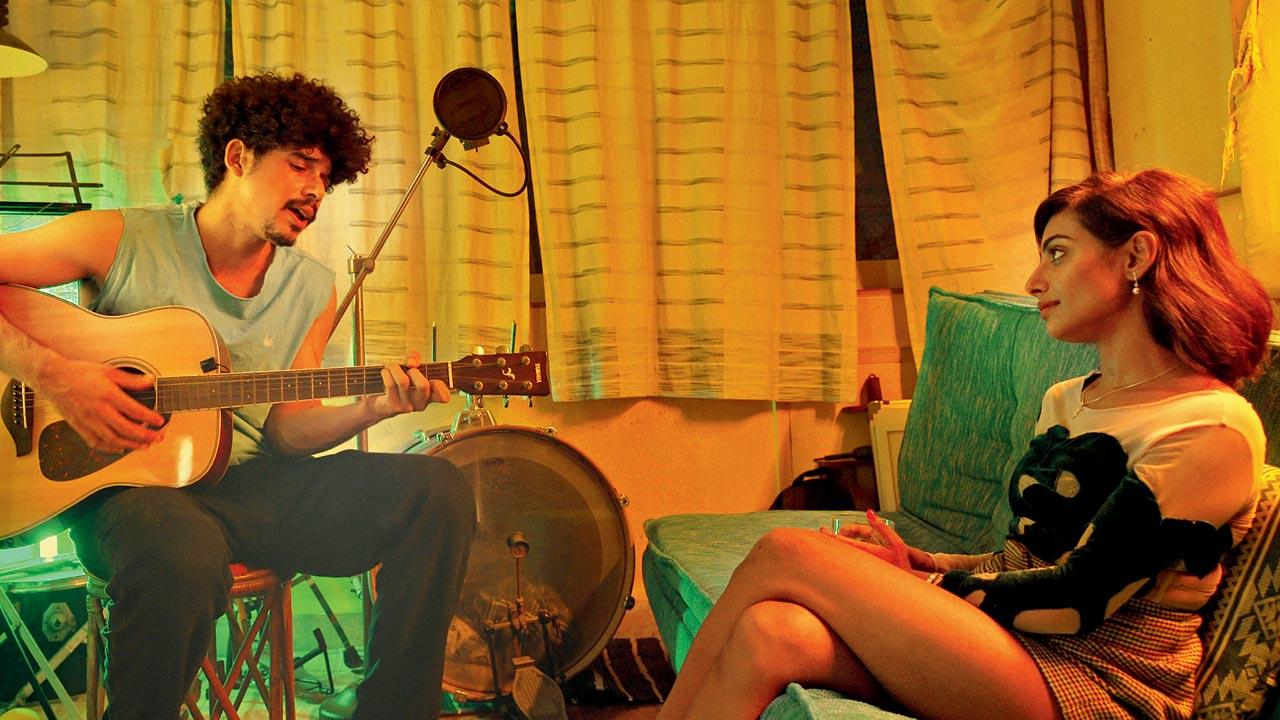 Imaad Shah and the host in a still from the show