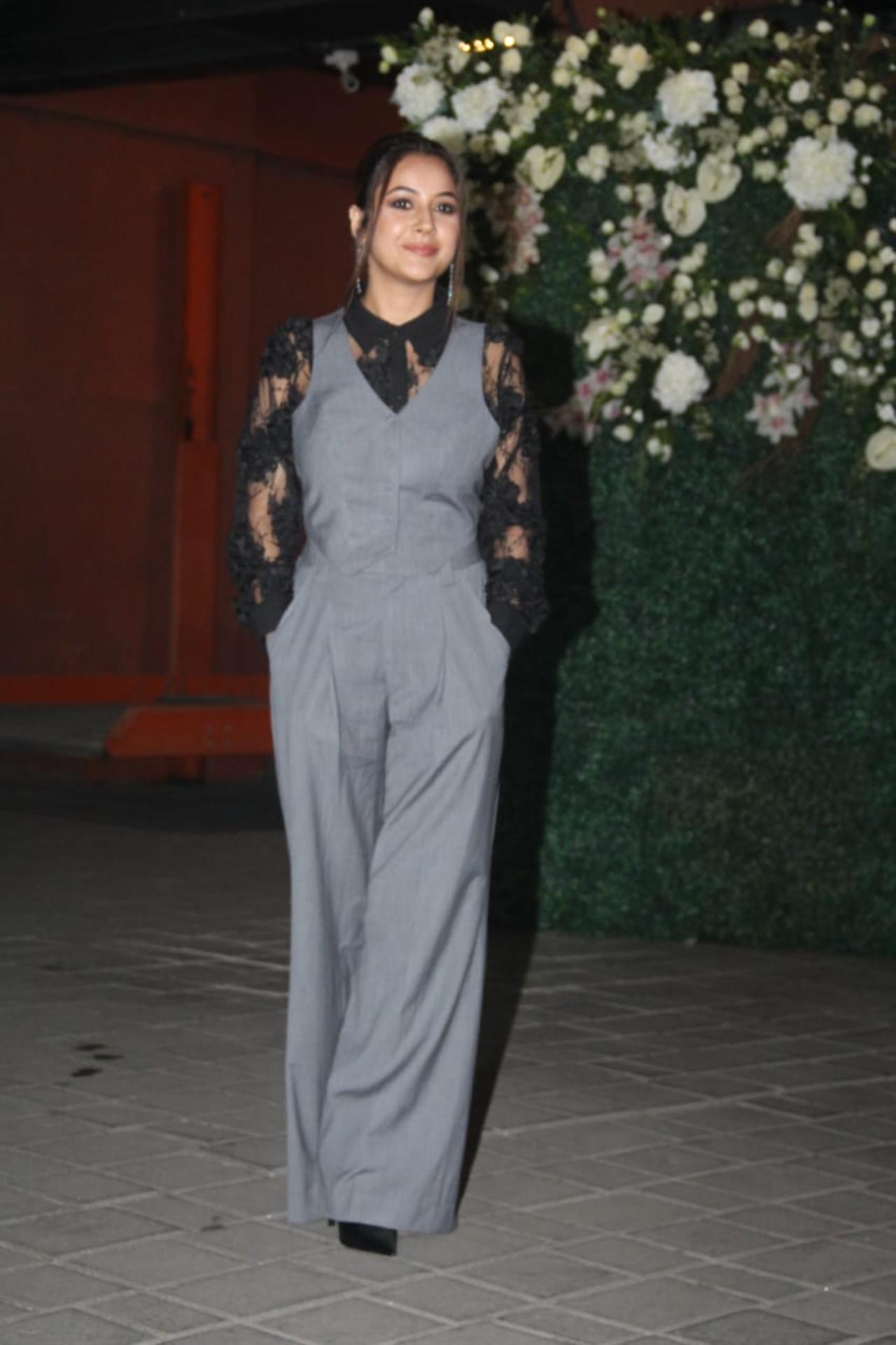 Shehnaaz Gill, who has a massive fan following post her Bigg Boss stint, has been a popular face at the Bollywood parties in the past week. For Aayush's birthday, she opted for a rather formal look with a monotone jumpsuit over a black lace top