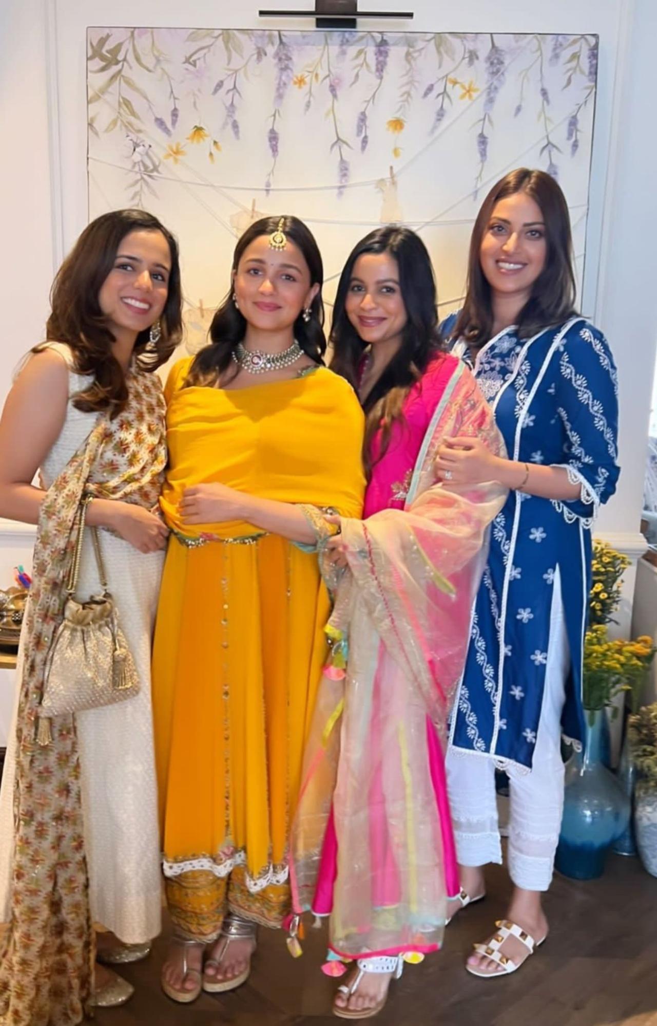 Taking to Instagram, actor Anushka Ranjan shared a glimpse from the baby shower in which Alia could be seen flaunting her cute smile in a yellow suit, standing beside her friends Anushka, Rishika Moghe and her sister Shaheen Bhatt. Soon after the picture was out, it got viral on social media