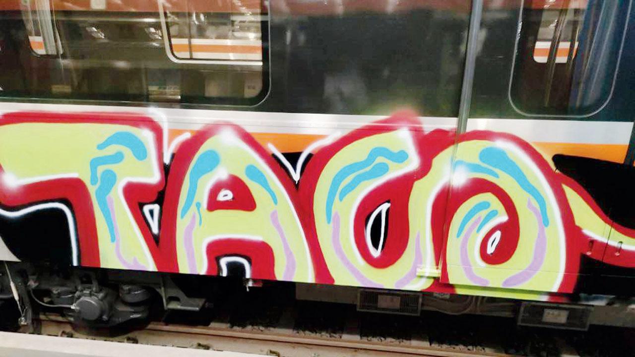 The graffiti they made on a Metro coach in Ahmedabad