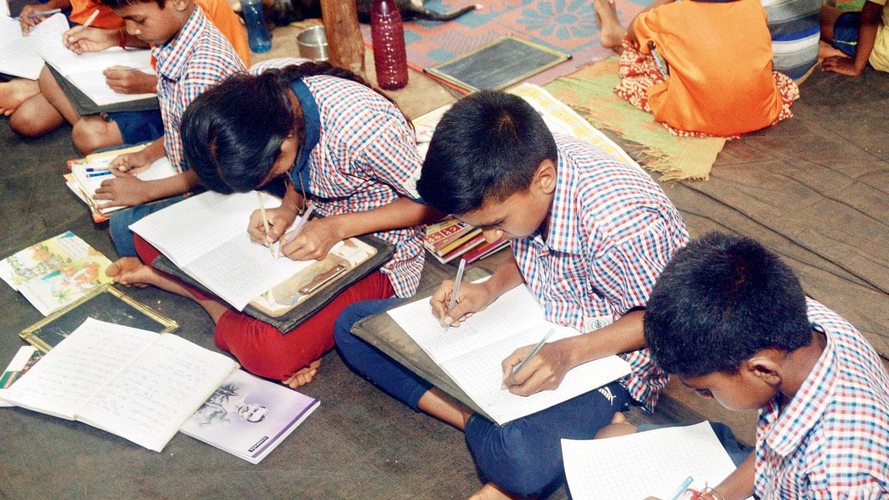 Gavit has taught all his students to be ambidextrous. They can also write in Hindi and English, simultaneously