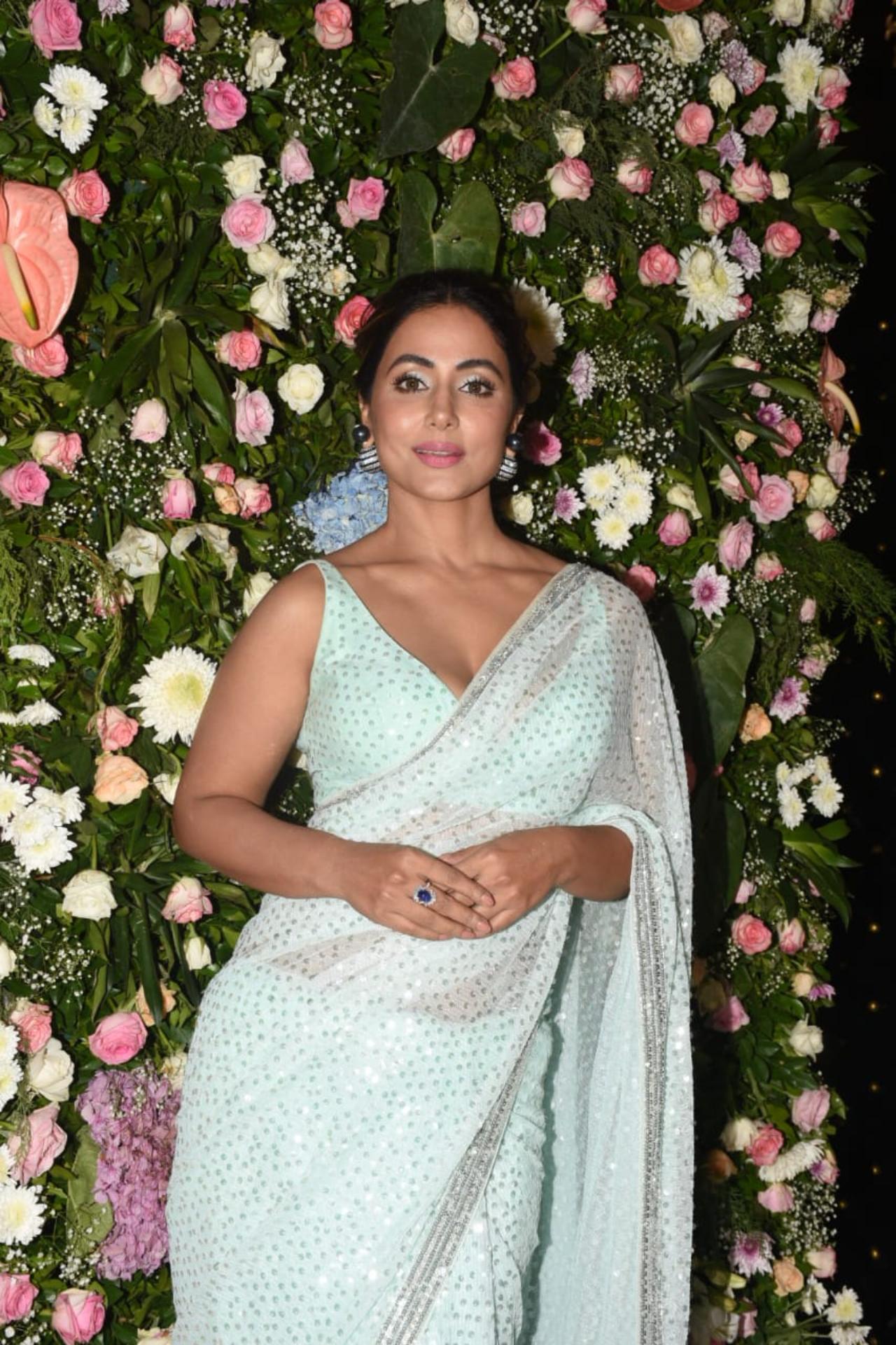 Hina Khan looked stunning in a sky blue saree and struck some confident poses for the paparazzi